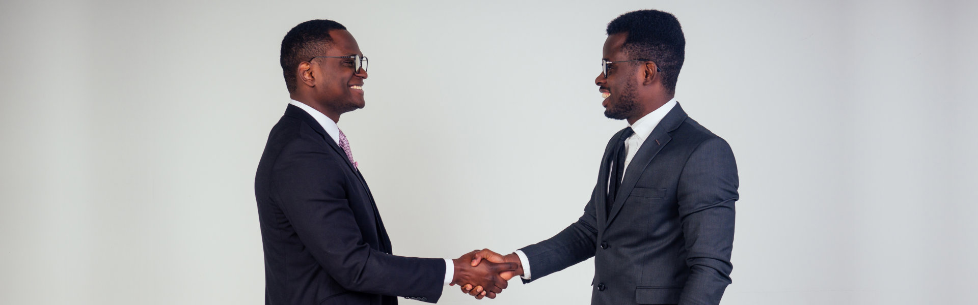 two men shaking hands